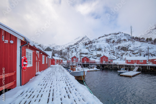 Fishing Motorboats and Red Houses Under the Snow