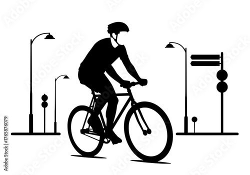 Urban cyclist riding a bicycle vector silhouette illustration with streetlights and traffic signs in the background
