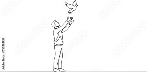 Minimalist man releasing dove symbolizes freedom, hope, and peac