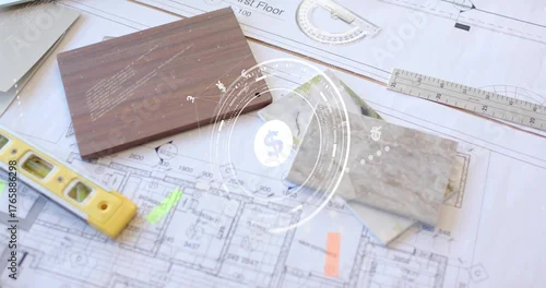 Fototapeta Showing architectural blueprints on studio desk with wood veneer tile swatches and measuring tools