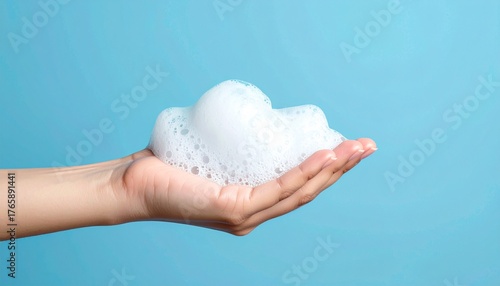 Hand Holding Fluffy Soap Foam, Hygiene Concept