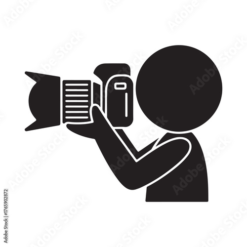 Silhouette of a person holding a professional camera and taking a photo