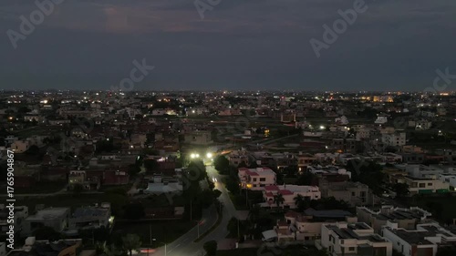 An aerial hyperlapse of city lights after dusk