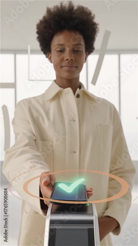 Woman using contactless payment technology in a modern setting