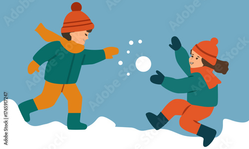  Girl and a boy are happily playing snowballs