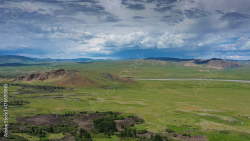 Steppe and mountains with rain landscape