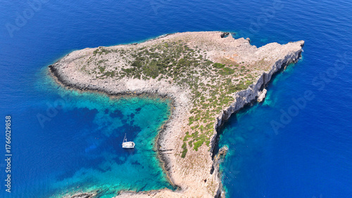 Aerial drone photo of breathtaking scenery in a small islet neat Porto Vromi visited by yachts, Zakinthos island, Ionian, Greece