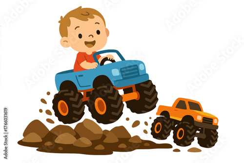 A toddler boy steering monster trucks across dirt and rocks