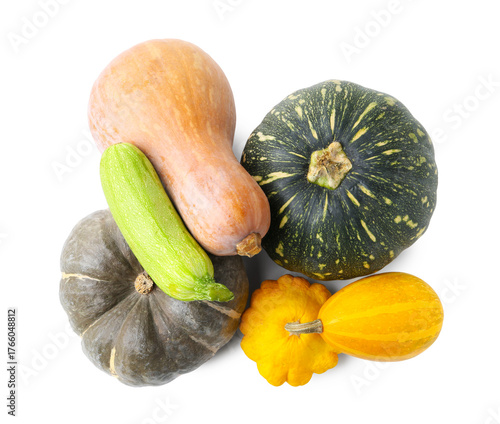 Photos Many fresh pumpkins and other vegetables of gourd family isolated on white, top