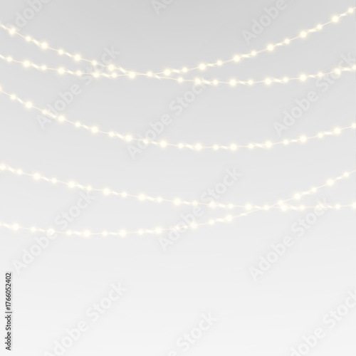 Golden fairy garland with glowing lights and festive celebration design.