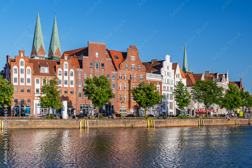 Obraz premium View of the old town of Luebeck, across the river Trave, Germany.