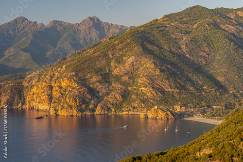 View of Porto town with Genoise de Porto Ota tower, Corsica island, France.