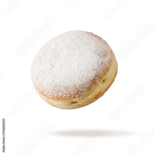 Single fresh baked donut sprinkled with sugar powder flying isolated on white background.