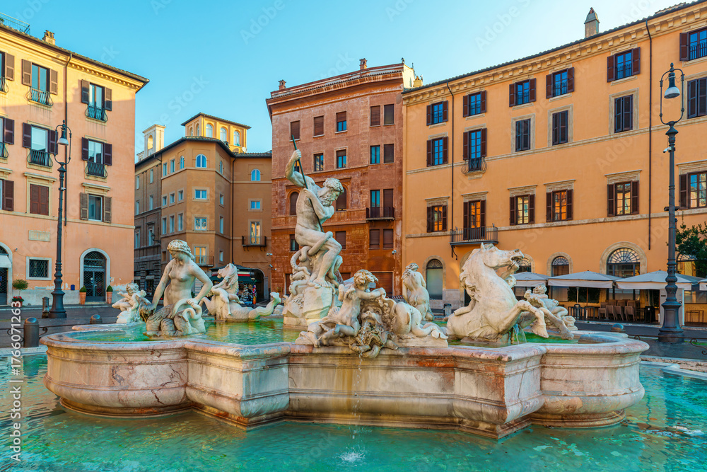 Naklejka premium Fountain of Neptune at Piazza Navona with colorful historic buildings in Rome, Italy at sunrise. Fontana del Nettuno on Italian square with Roman architecture. Travel and touristic landmark
