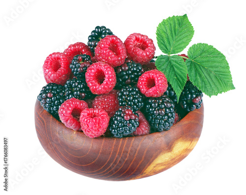 Fotografie fresh ripe raspberries and blackberries in a bowl isolated on a transparent background