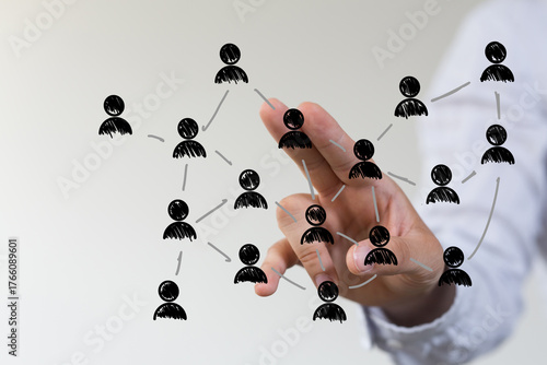 Tapet Hand reaching out to interact with network connections and relationships, repres