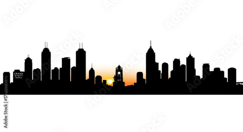 Silhouette of the manila skyline with the grand hyatt manila and a sunset in the background view of the city