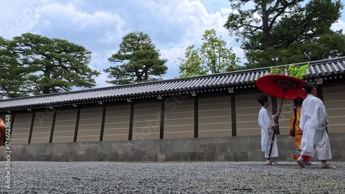 Timelapse of Procession of Aoi Matsuri (Hollyhock Festival) with people in traditional noble clothing in Kyoto, Japan