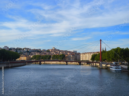 Lyon, France, May 29, 2025, View of the Rhone River and its embankment, waterfront Blue Sky