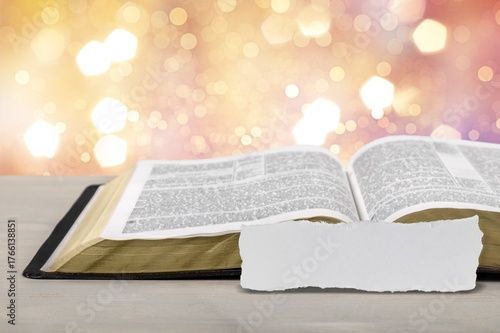 Handwritten white blank card and bible book