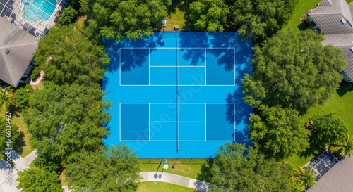 Aerial view of a pickleball court in a suburban neighborhood