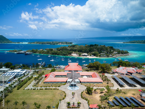 Aerial View of Vanuatu Parliament Building with Iririki Island and Port Vila Harbour in the Background