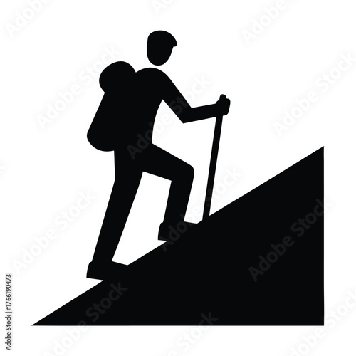 Silhouette of a hiker with a backpack and trekking pole ascending a steep incline