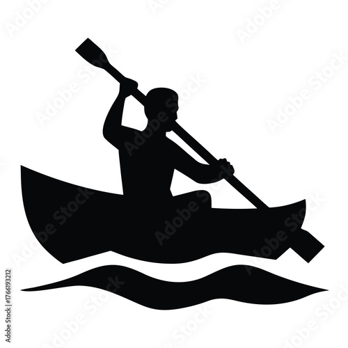 Silhouette of a person paddling a canoe on wavy water representing outdoor recreation and adventure