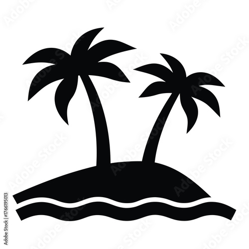 Silhouette of two palm trees on a small island with wavy ocean water below