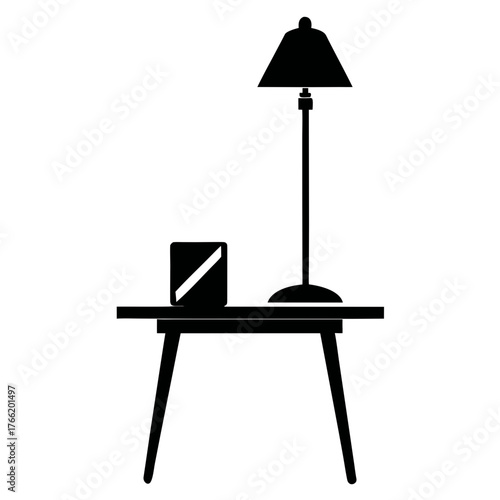 Simple silhouette of a side table with lamp and book