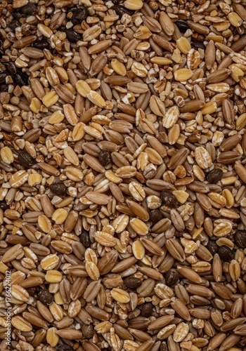A close up shot of various wholemeal grains mixed together, emphasizing natural ingredients, healthy eating, and dietary fiber content ,nutrition ,seed ,wellness
