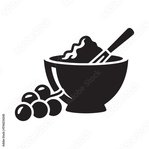 Simple silhouette icon of a bowl of mashed food with grapes and spoon