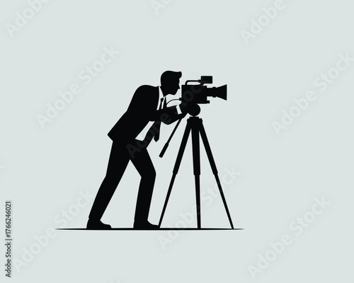 Cameraman filming with professional equipment video camera tripod