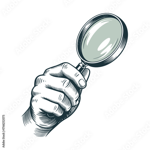 Hand holding a magnifying glass for inspection and discovery
