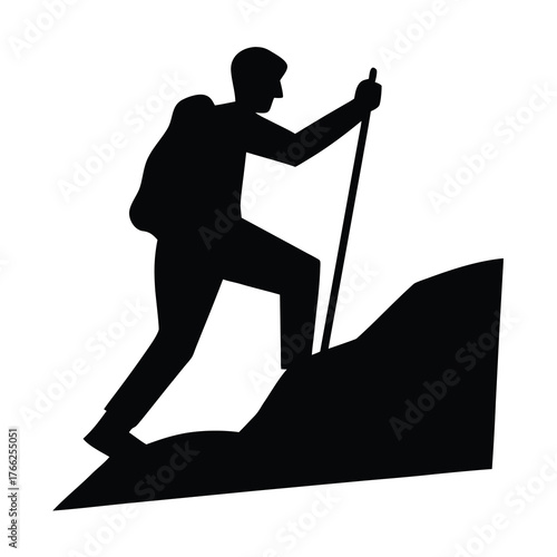Silhouette of a hiker with a backpack and trekking pole ascending a rocky incline