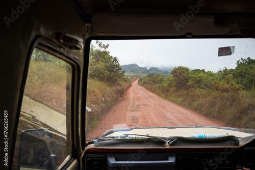 Driving View from Inside a 4x4 Vehicle on a Remote Dirt Road Through the Jungle in Africa