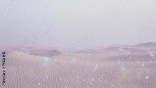 A hazy desert landscape with soft sand dunes and a pale, dreamy sky