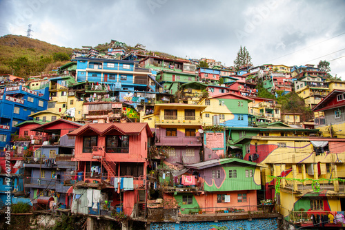 Valley of Colors - colorful Stobosa hillside. Massive artwork made up of a tightly packed cluster of hillside homes painted in bold colors. La Trinidad, Benguet, Baguio, Philiphines