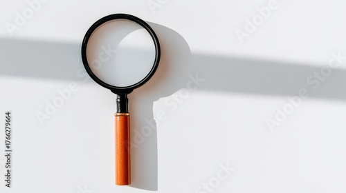 Premium magnifying glass with ergonomic wooden handle for detailed reading hobby and inspection tasks.
