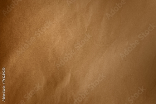 Warm caramel brown tone color paint on blank eco environmental friendly wrap paper texture background with space minimal style 