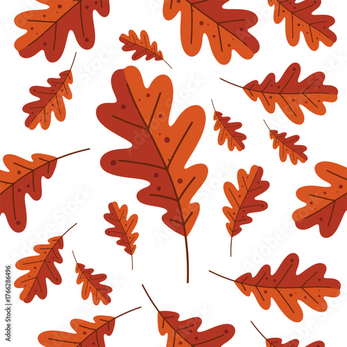 Scattered autumn leaves in shades of orange and brown against.