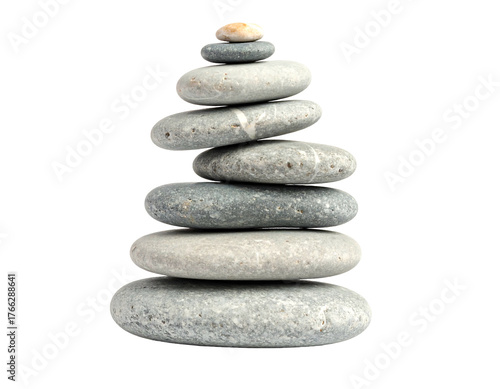 Stack of seven smooth gray stones balancing in zen-like arrangement against a clean black background