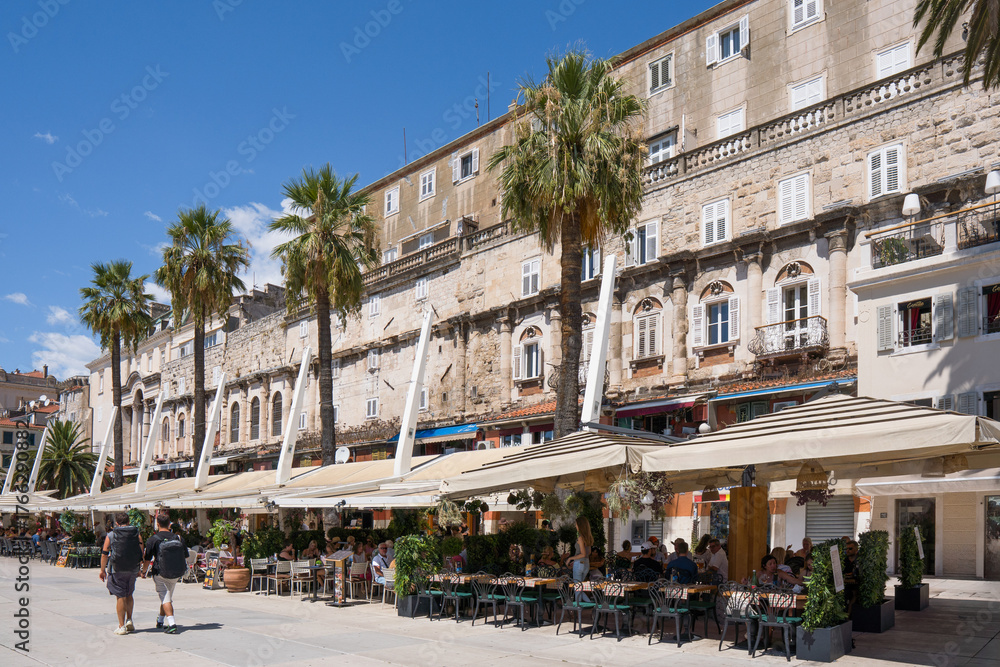 Naklejka premium People enjoying cafes along the Riva promenade in Split, Croatia