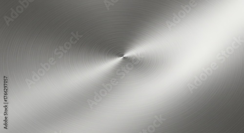 Circular brushed metallic surface with gradient light and radial texture