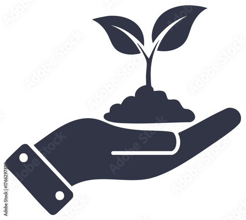 Hand holding a seedling in fertile soil representing growth and new beginnings