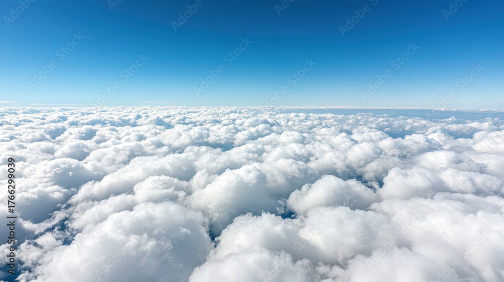 Fototapeta premium Fluffy white clouds blanket sky, creating serene and calming atmosphere