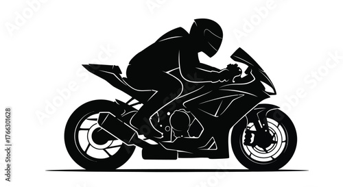 Silhouette of a motorcyclist riding a powerful sports bike in motion