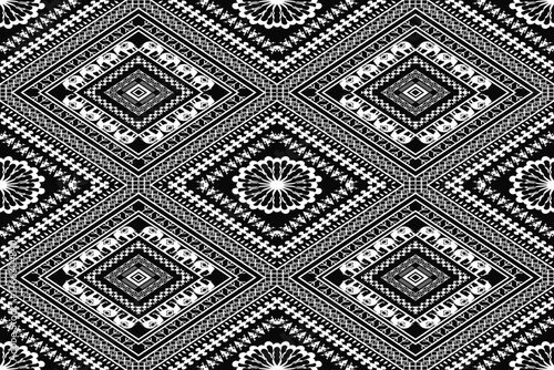 Elegant black and white tribal ethnic pattern with diamond shapes and geometric details. Classic, luxurious, and versatile — ideal for fashion textiles, wallpapers, home decor, and cultural design pro
