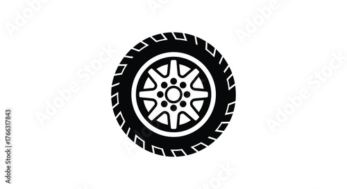 A striking black silhouette of a car tire with a detailed rim against a clean white background symbolizing automotive and transportation themes silhouette