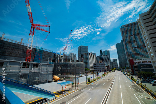A cityscape of the crane at the under construction in Tokyo wide shot